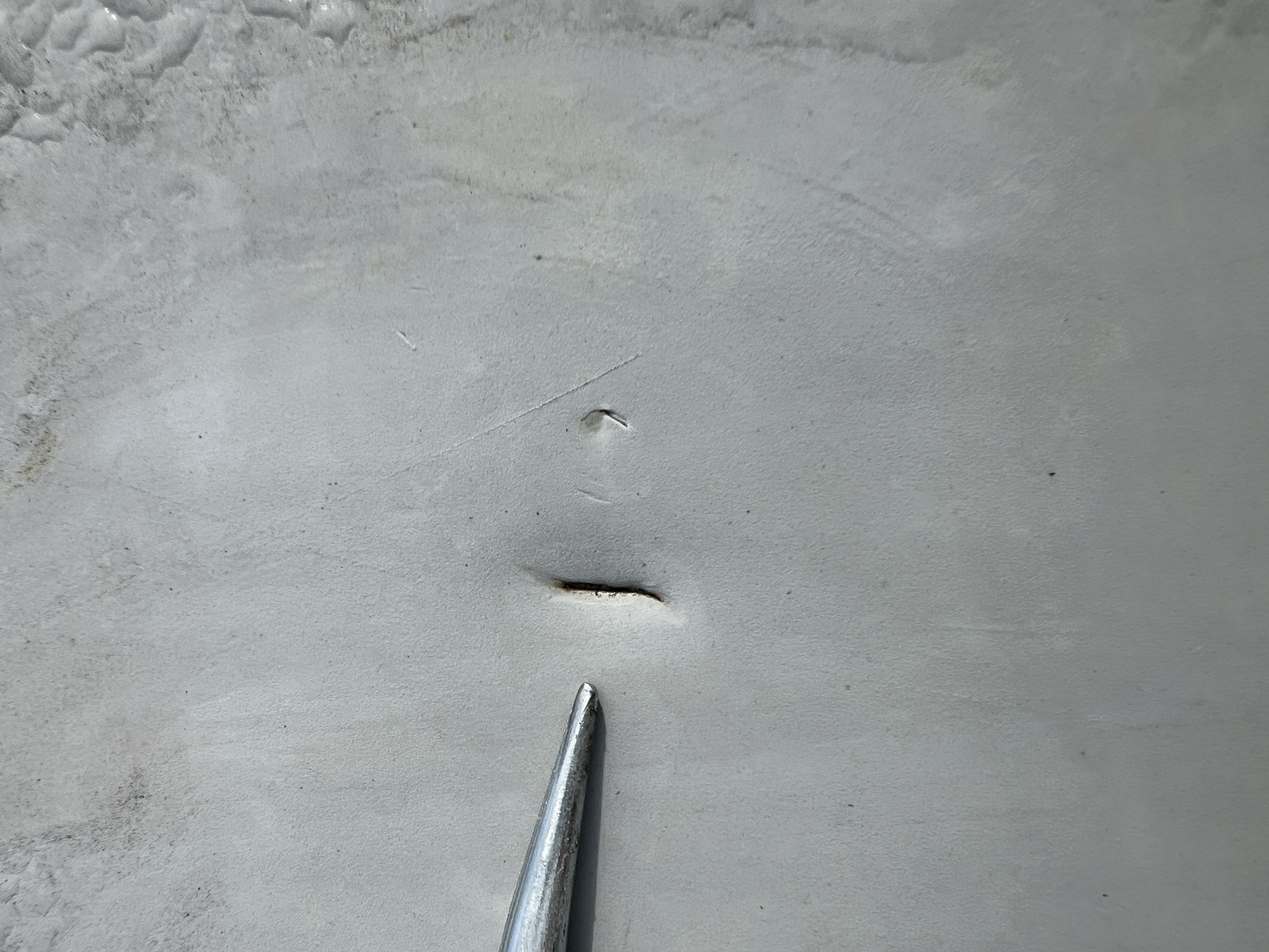 ELD technician locating a waterproofing breach for targeted repair